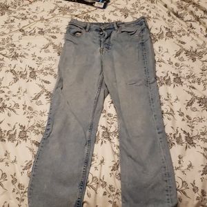 Light-wash distressed mom jeans